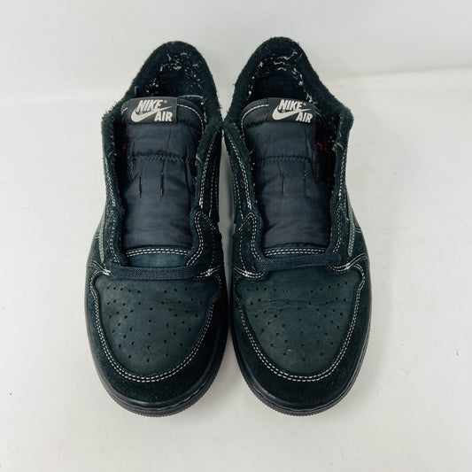 The Jordan 1 Retro Low OG SP Travis Scott Black Phantom sneaker, featured on a Nike box, flaunts black suede with a clean upper and white swoosh. Size info: US 9.5, Euro 43, UK 8.5, CM 27.5—ideal for general wear due to its visible stitching design.