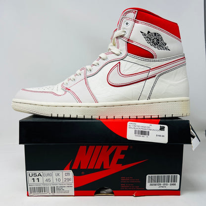 A Jordan 1 Retro High Phantom Gym Red sneaker, USA size 11, with clean white uppers and red accents like the swoosh, sits atop its black and red box. Priced at $1,160, it shows only light wear.