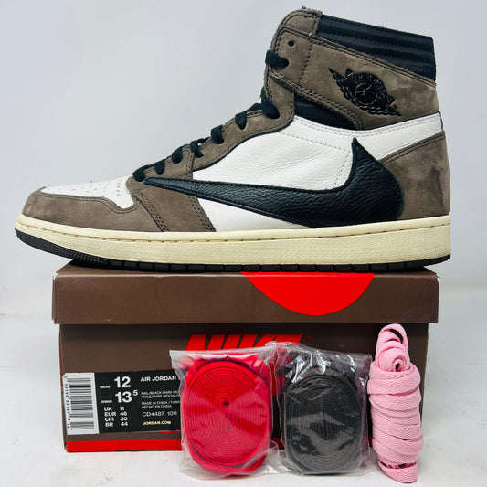 Jordan 1 Retro High OG SP Travis Scott Mocha sneakers with extra laces on a Nike box.