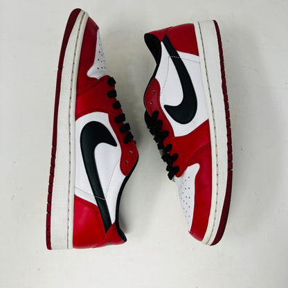 Jordan 1 Retro Low Chicago 2016 sneakers with red, white, and black design, displayed on a Nike box.