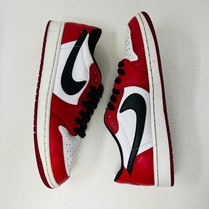 Jordan 1 Retro Low Chicago 2016 sneakers with red, white, and black design, displayed on a Nike box.