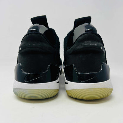 Nike Adapt BB Black Pure Platinum sneakers, condition 8.5/10, visible signs of wear, includes charging pad/cable and shoe tree, 2019 model.