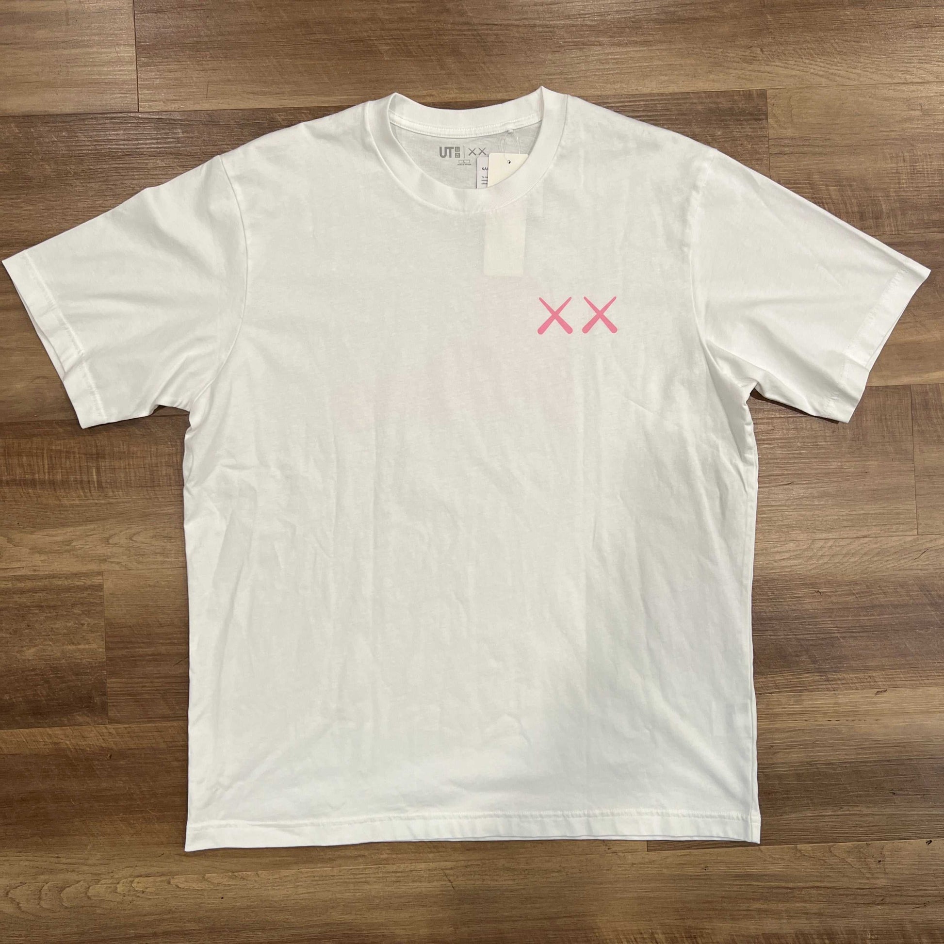 KAWS x Uniqlo Kids UT short sleeve graphic T-shirt in white, size L, brand new.