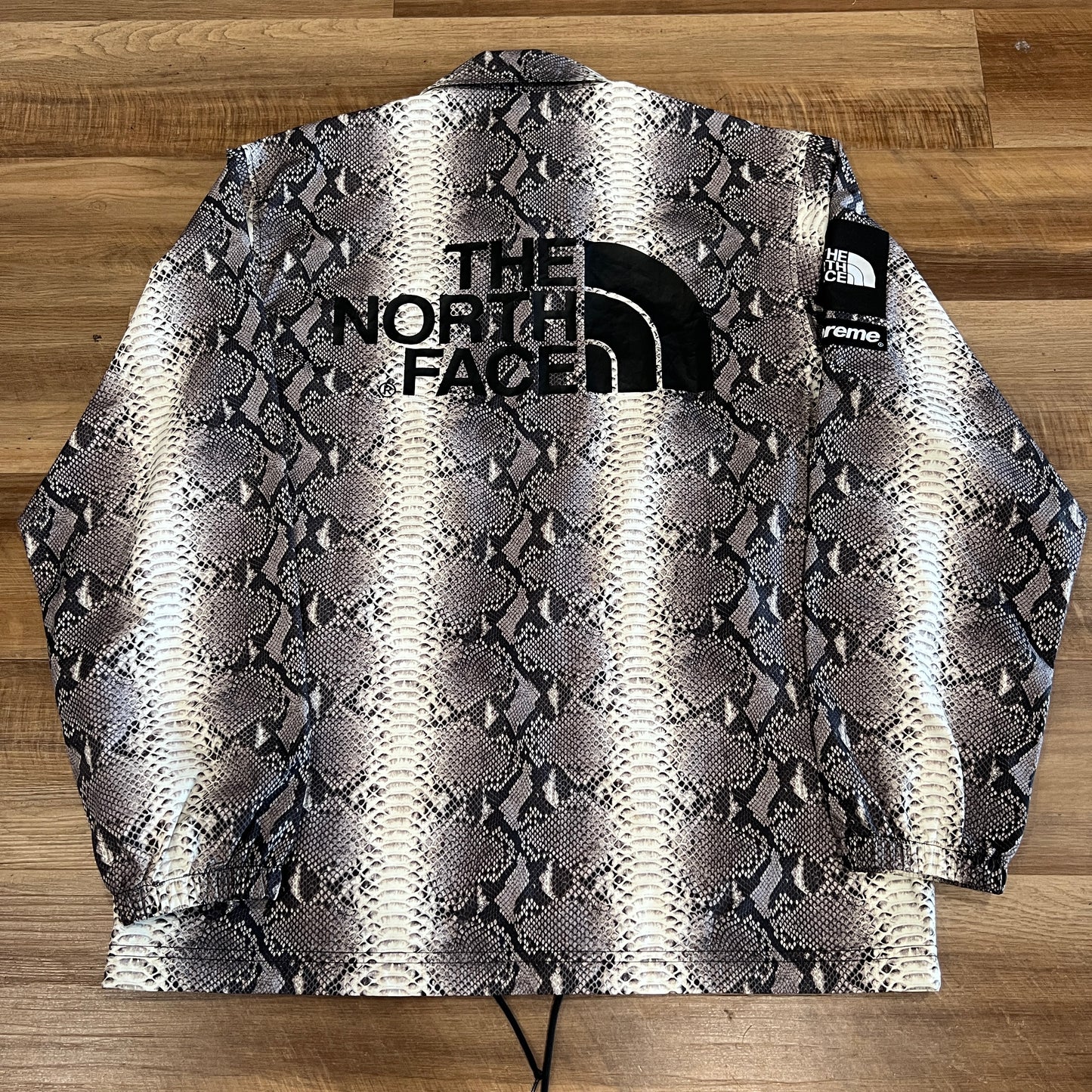 Supreme The North Face Snakeskin Taped Seam Coaches Jacket Black