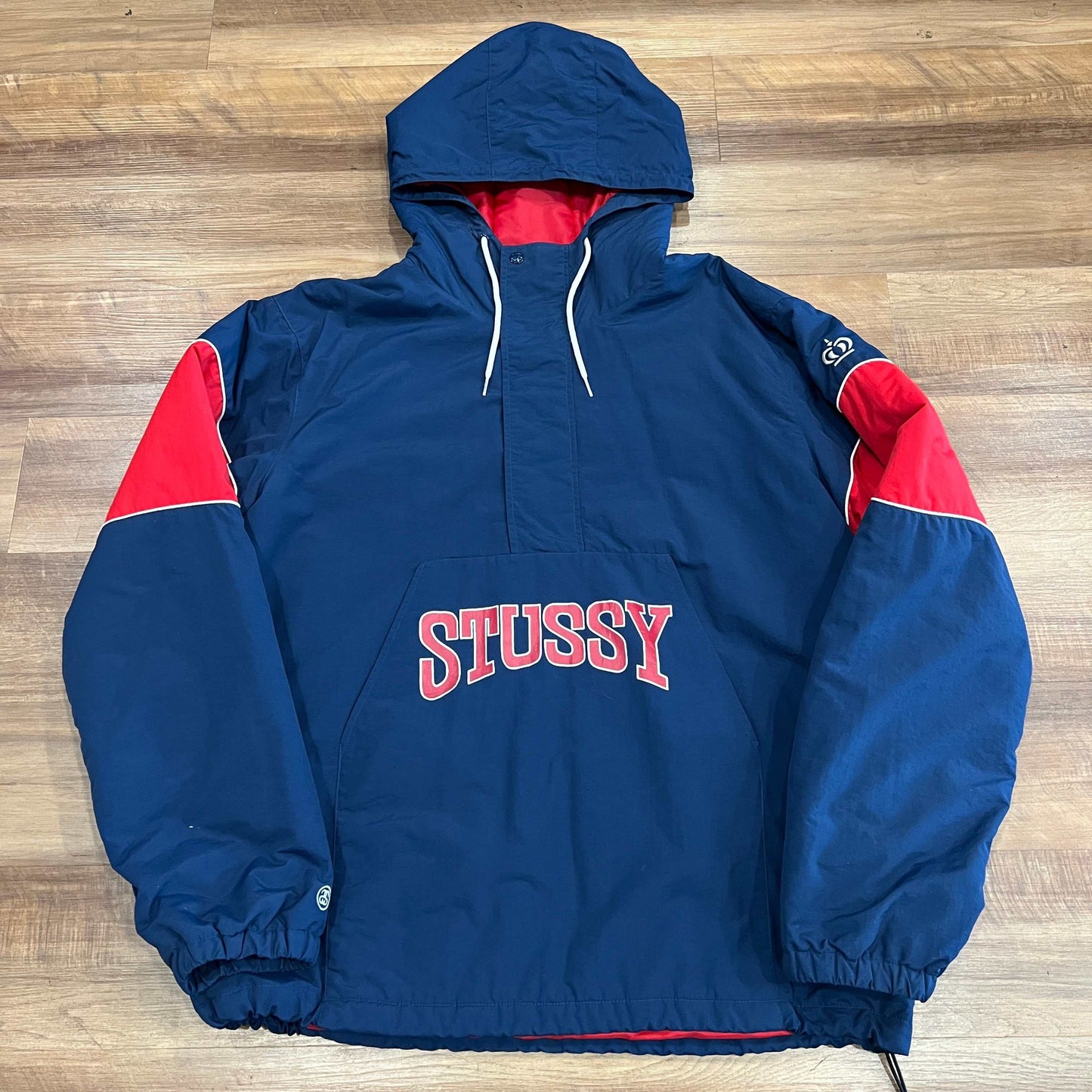 Men's Stussy Sport pullover 1/4 zip with spell-out logo, size XXL, preowned condition.