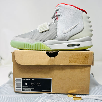 Nike Air Yeezy 2 Pure Platinum sneakers, size 9M, new condition, slightly damaged box, includes dustbag.