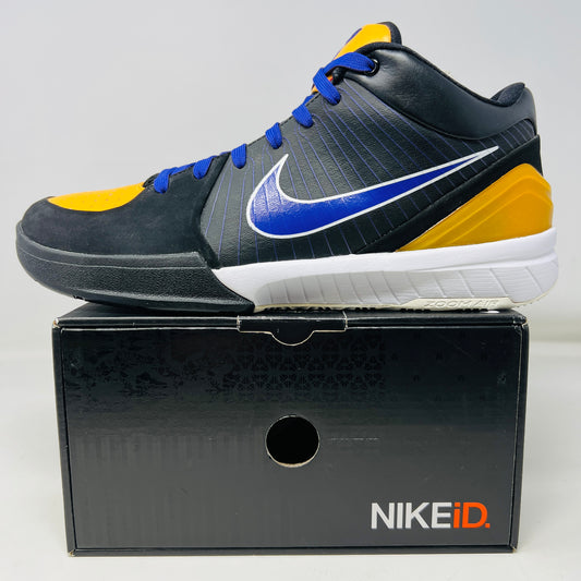 The Kobe 4 Nike ID Lakers Away by KOBE, in black with blue swoosh and white midsole, features vibrant yellow accents on the toe and heel. It sits proudly on a black NikeID box with accessories included; the box remains in good condition.