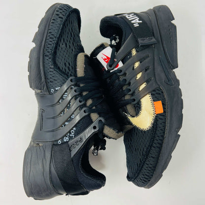 Nike Air Presto Off-White Black 2018 sneakers with orange laces and hang tag on box.