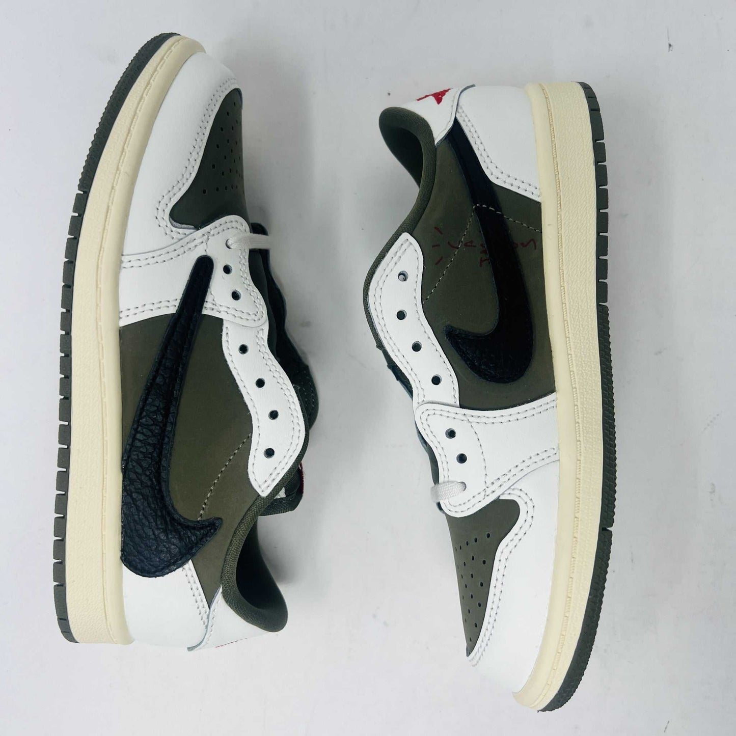 Jordan 1 Retro Low OG SP Travis Scott Medium Olive PS sneaker, brand new with original box and accessories, 2024 edition.