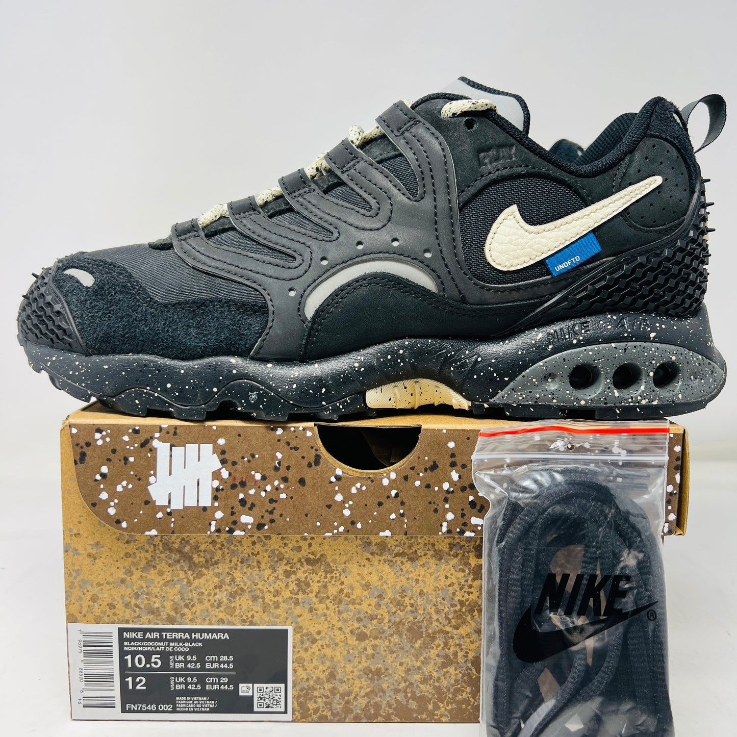 Nike Air Terra Humara Undefeated Black sneakers, size 10.5, with extra laces and good box condition.