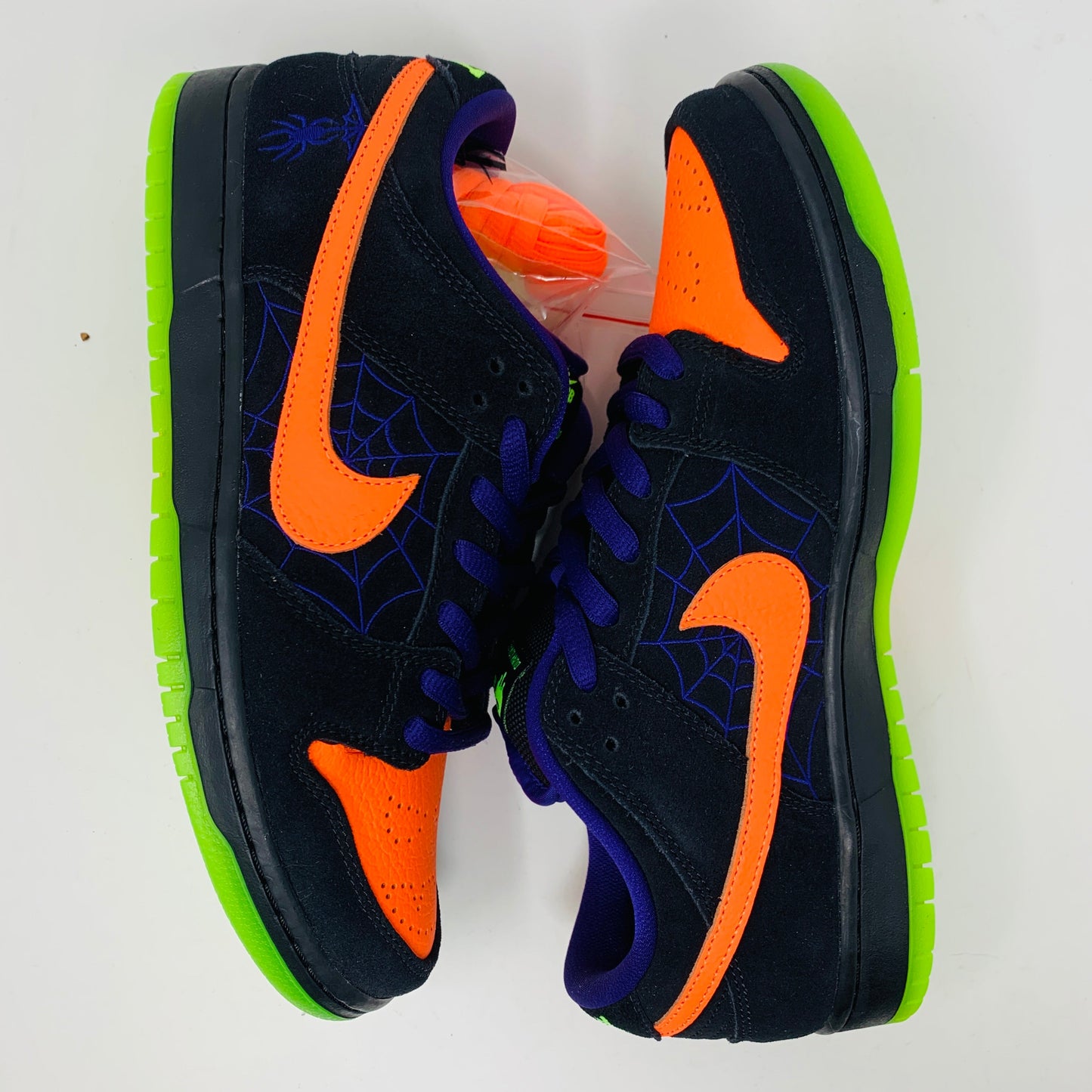 Nike SB Dunk Low Night of Mischief Halloween sneakers, brand new, with orange and green accents on black, 2019 release.