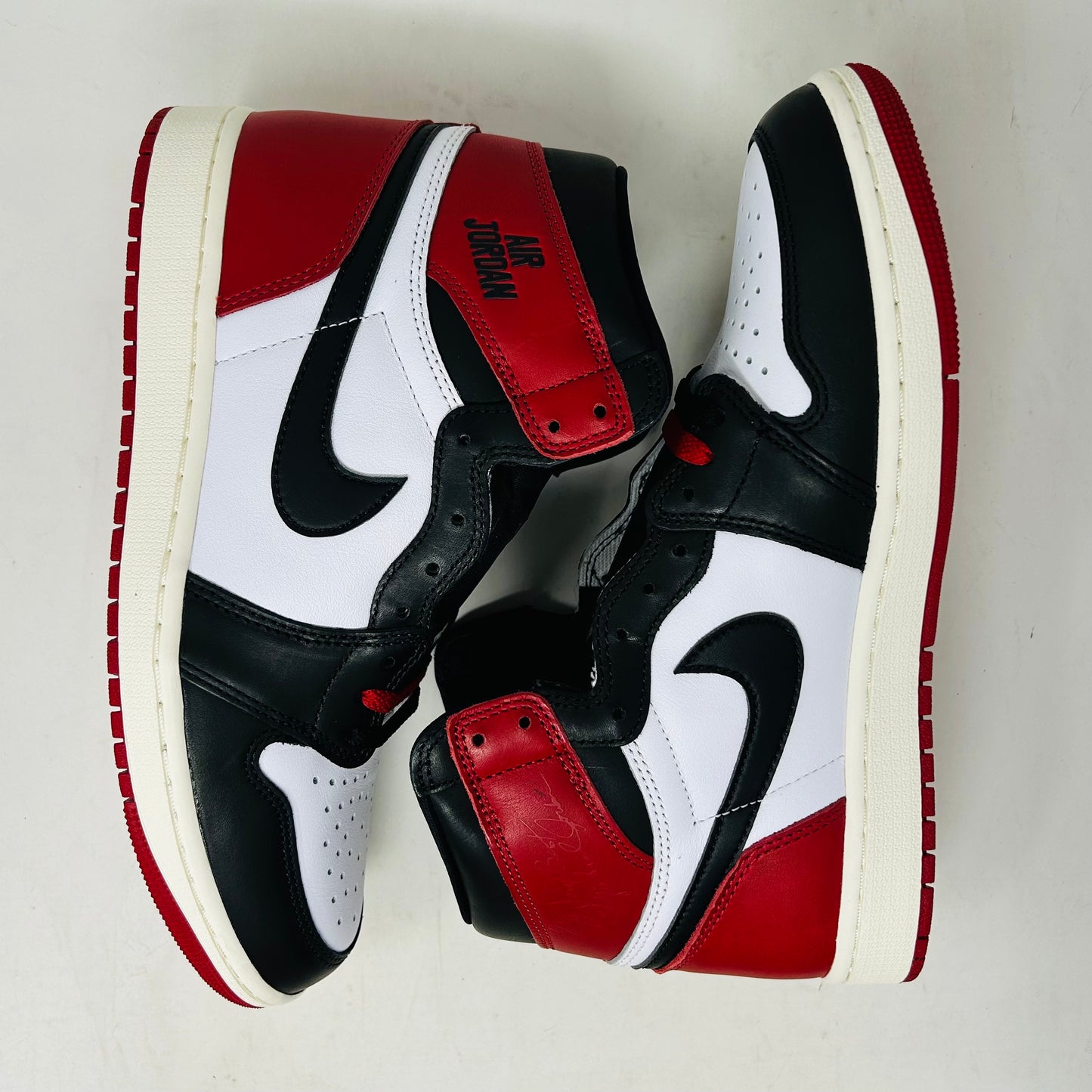 Jordan 1 Retro High OG Black Toe Reimagined - Holy Ground Sneaker Shop