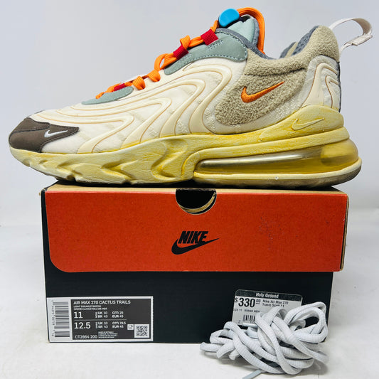 The 2020 Nike Air Max 270 React ENG Travis Scott Cactus Trails features tan, orange, and yellow hues atop its black and red box. It includes a white shoelace as extra laces, with a price tag of $330.