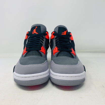 A pair of Jordan 4 Infrared sneakers by Jordan, featuring a gray mesh panel, black laces, and red accents with a distinctive logo on the tongue. They are positioned side by side on a white surface against a plain background.