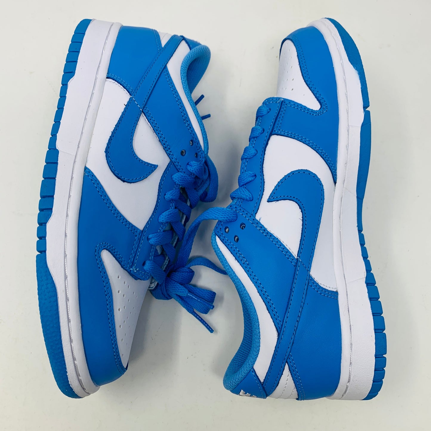 Nike Dunk Low UNC GS in blue and white, brand new condition, 2021/2024 model.