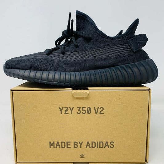 Yeezy 350 V2 Onyx sneaker on display box with black and grey design.