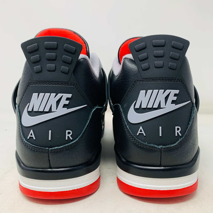 Jordan 4 Retro Bred Reimagined with Nike Air branding on heel tab.