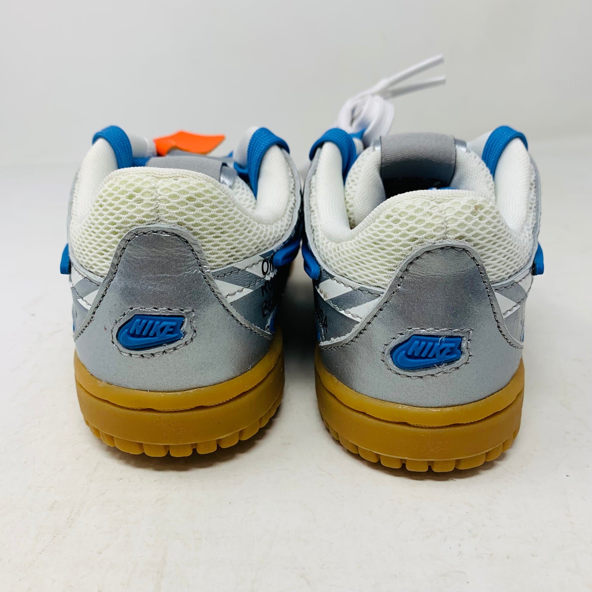 Nike Air Rubber Dunk Off-White University Blue TD toddler shoes with rubber sole and iconic side logo.