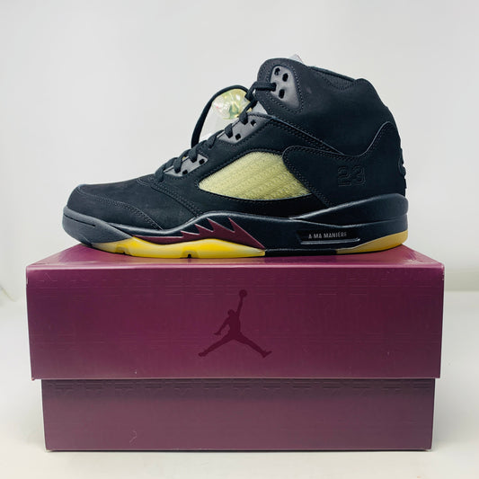 Jordan 5 Retro A Ma Maniére Dusk sneaker, black upper, yellow sole, on Jordan box.