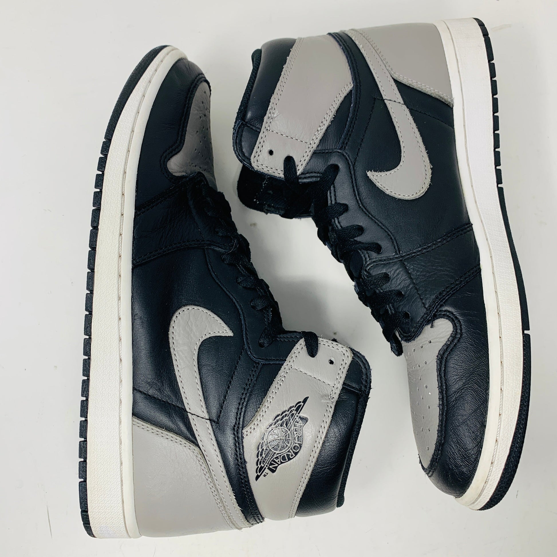 Jordan 1 Retro High Shadow (2018) sneakers in size 11.5 showing clean uppers and worn outsoles.