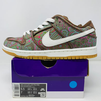 Nike SB Dunk Low Pro Paisley Brown sneakers on box, side view.