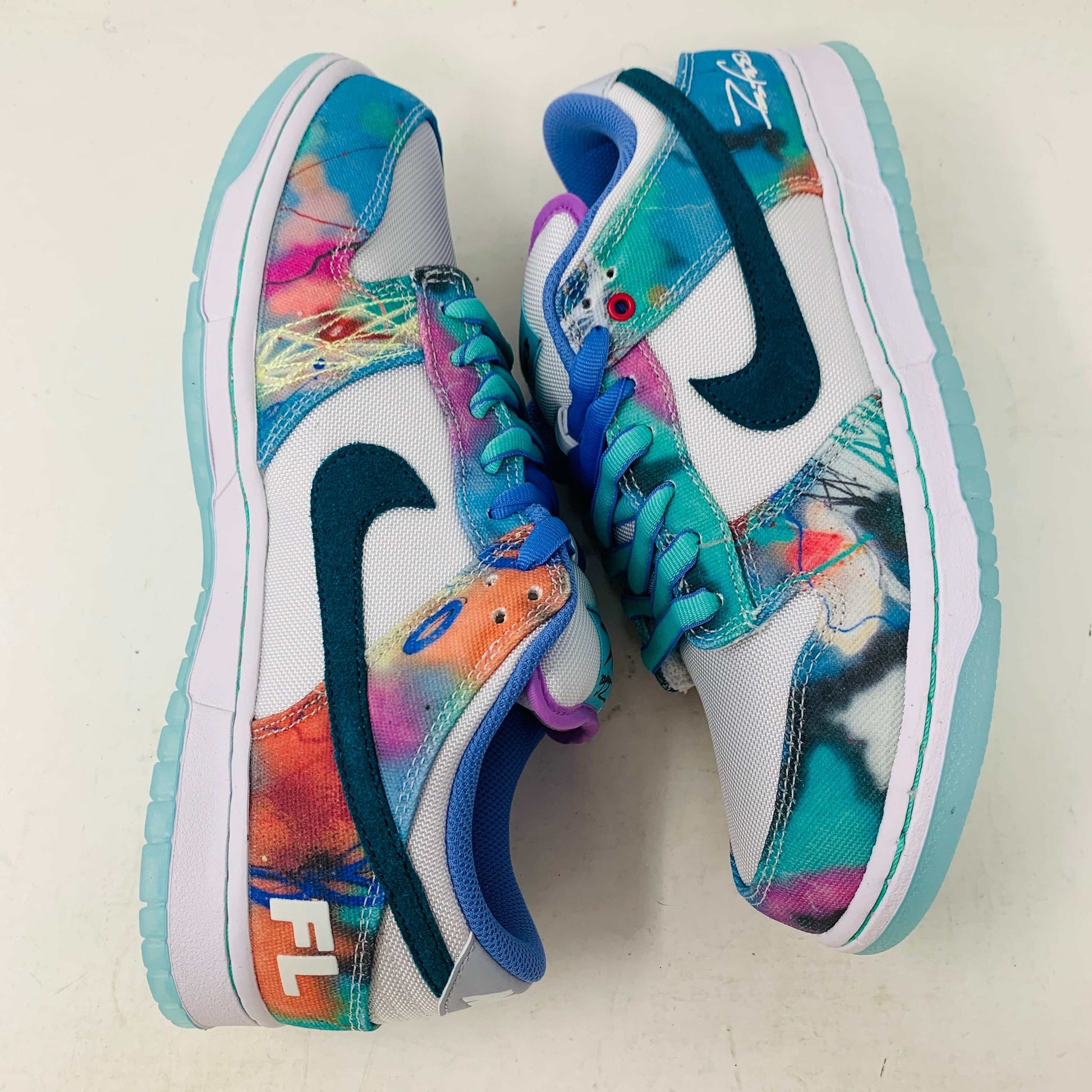 Nike SB Dunk Low Futura Laboratories Bleached Aqua sneaker with unique colorway and durable design.