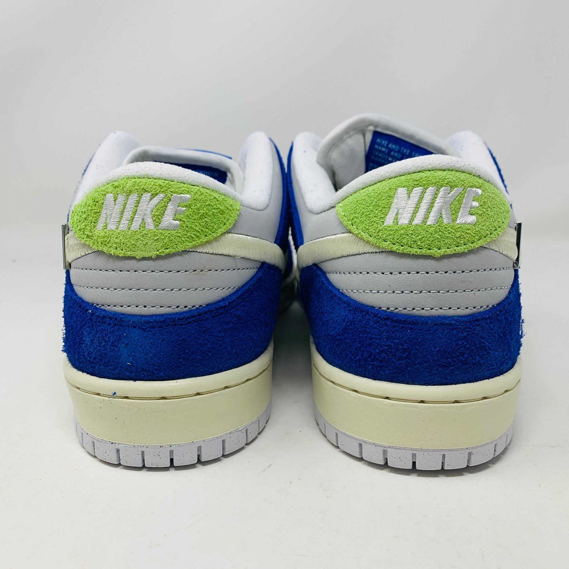 Nike SB Dunk Low Pro Fly Streetwear Gardenia sneakers with gardenia white and black colorway, featuring padded collar and Zoom Air unit for comfort.