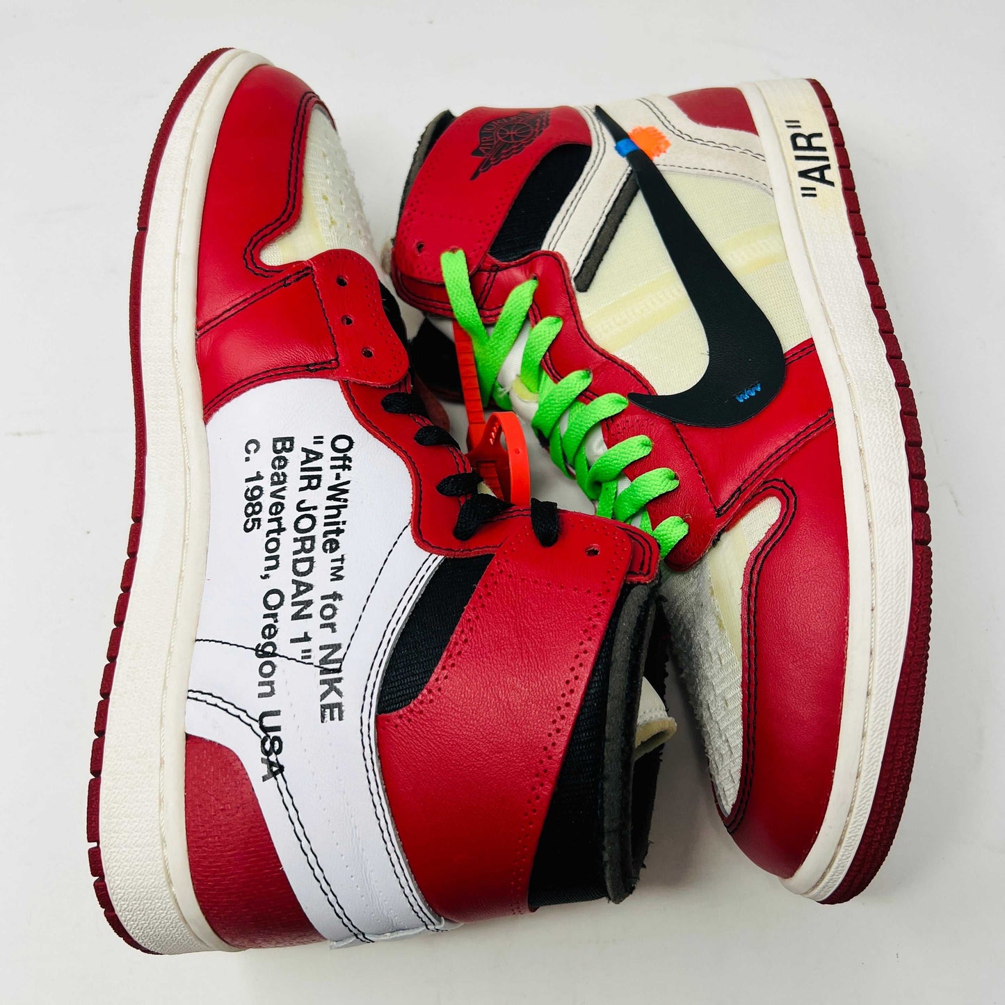 Jordan 1 Retro High Off-White Chicago sneaker with red and white colorway and Off-White branding.