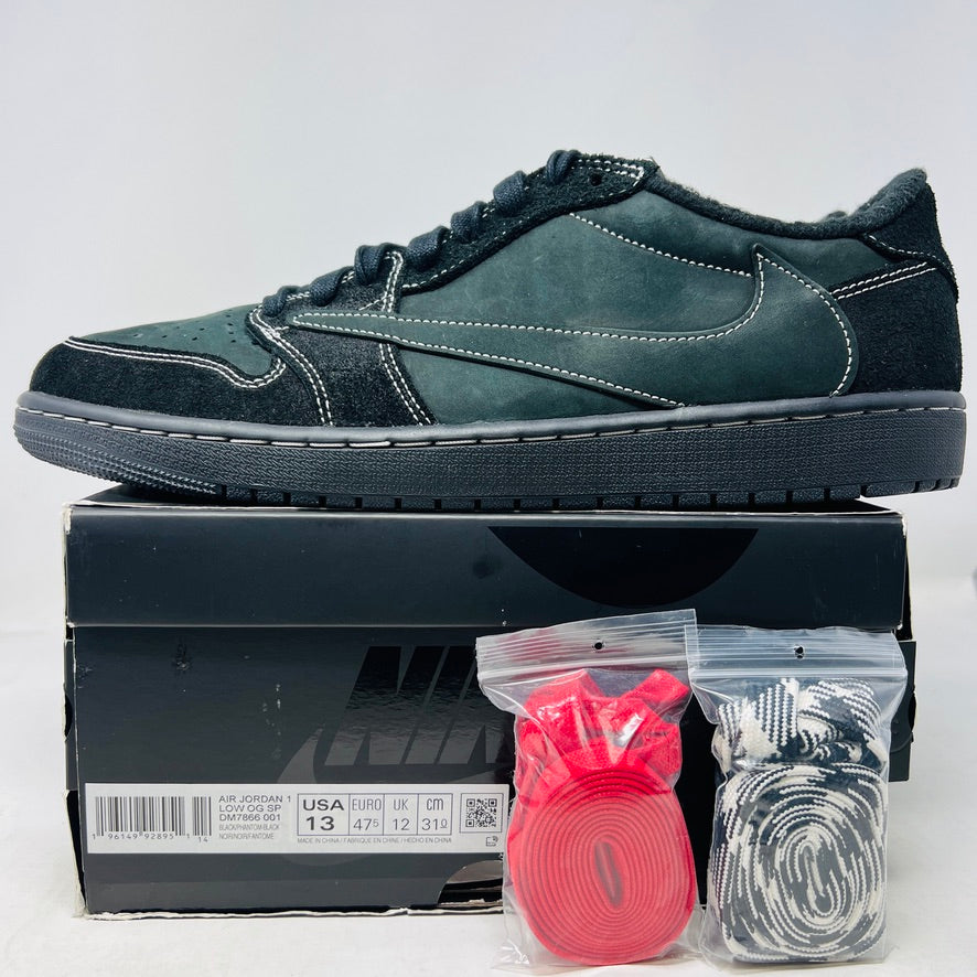 The Jordan 1 Retro Low OG SP Travis Scott Black Phantom sneakers feature a reversed swoosh logo and come in black and green, displayed on a box. They include two extra lace sets: red and black-and-white, ideal for maintaining the UPPERS CLEAN while ensuring an OG ALL style without heel drag.