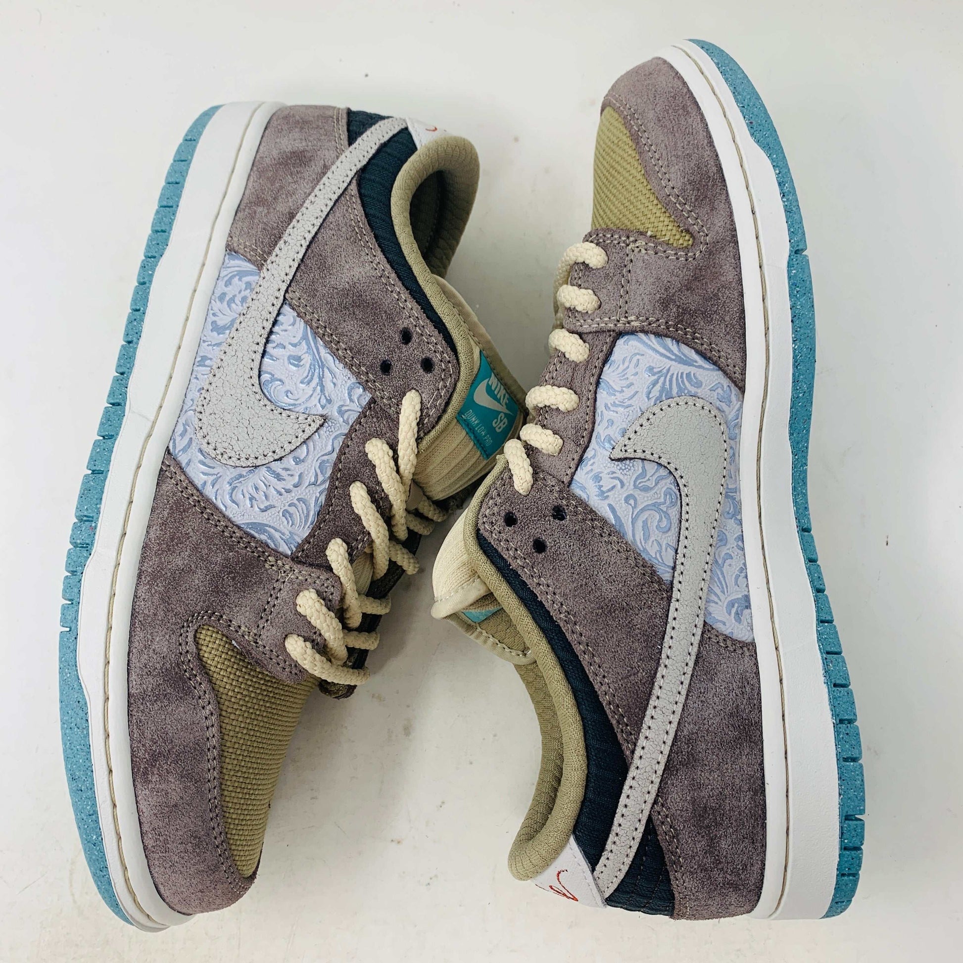 Nike SB Dunk Low Big Money Savings sneakers with multicolor suede and patterned details.