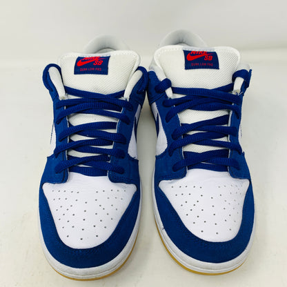 The 2022 Nike SB Dunk Low Los Angeles Dodgers by Nike has authentic blue and white leather panels, blue laces, and a white tongue with the red Nike SB logo, displayed side by side on a plain white background.