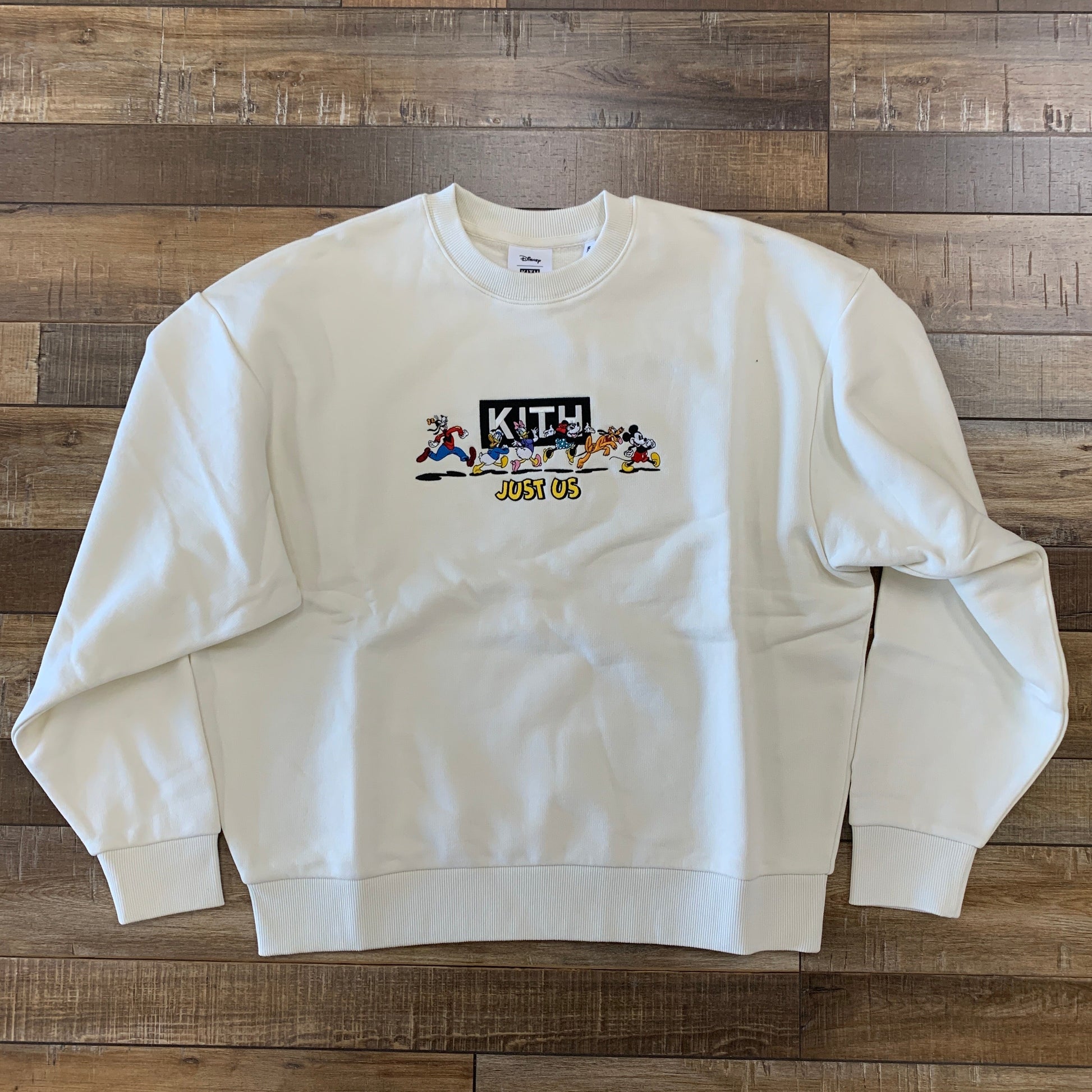 Kith x Disney Mickey & Friends Family Crewneck Sandrift in brand new condition.