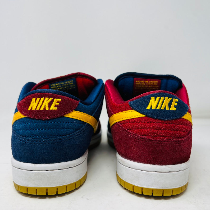 Nike SB Dunk Low Barcelona sneakers, size 8.5, rear view showing clean uppers and general sole wear.