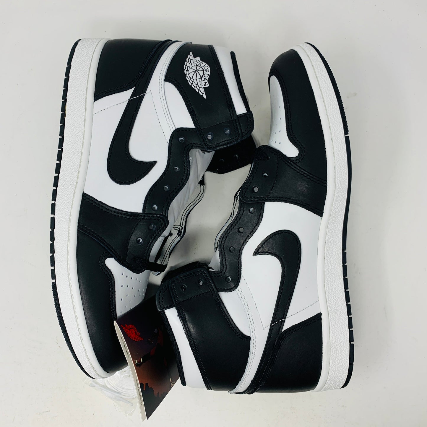 Jordan 1 Retro High 85 Black White 2023 sneakers with extra white laces, brand new condition.