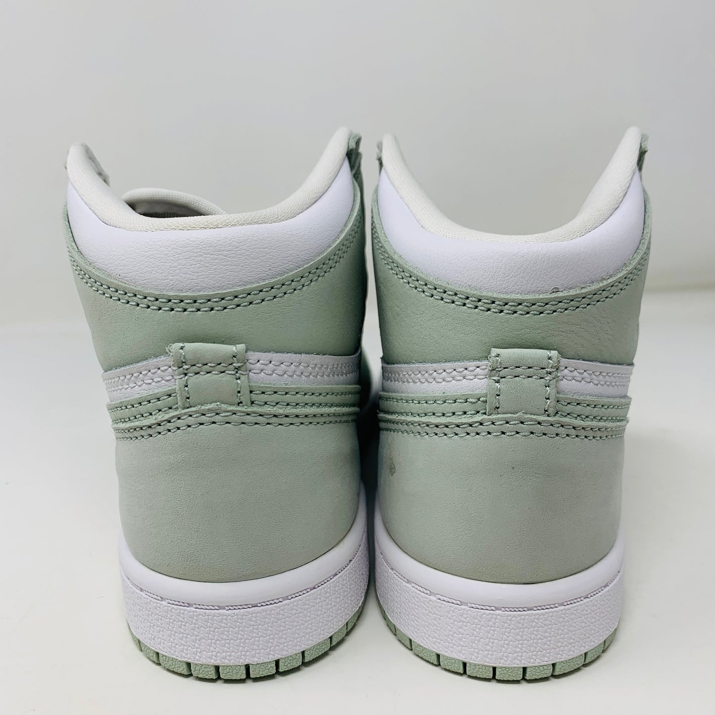 Jordan 1 Retro High OG Seafoam PS sneaker in seafoam green, rear view showing ankle-high design.