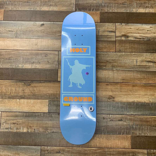 Holy Ground Argon Skate Deck with vibrant argon graphic on wooden floor.