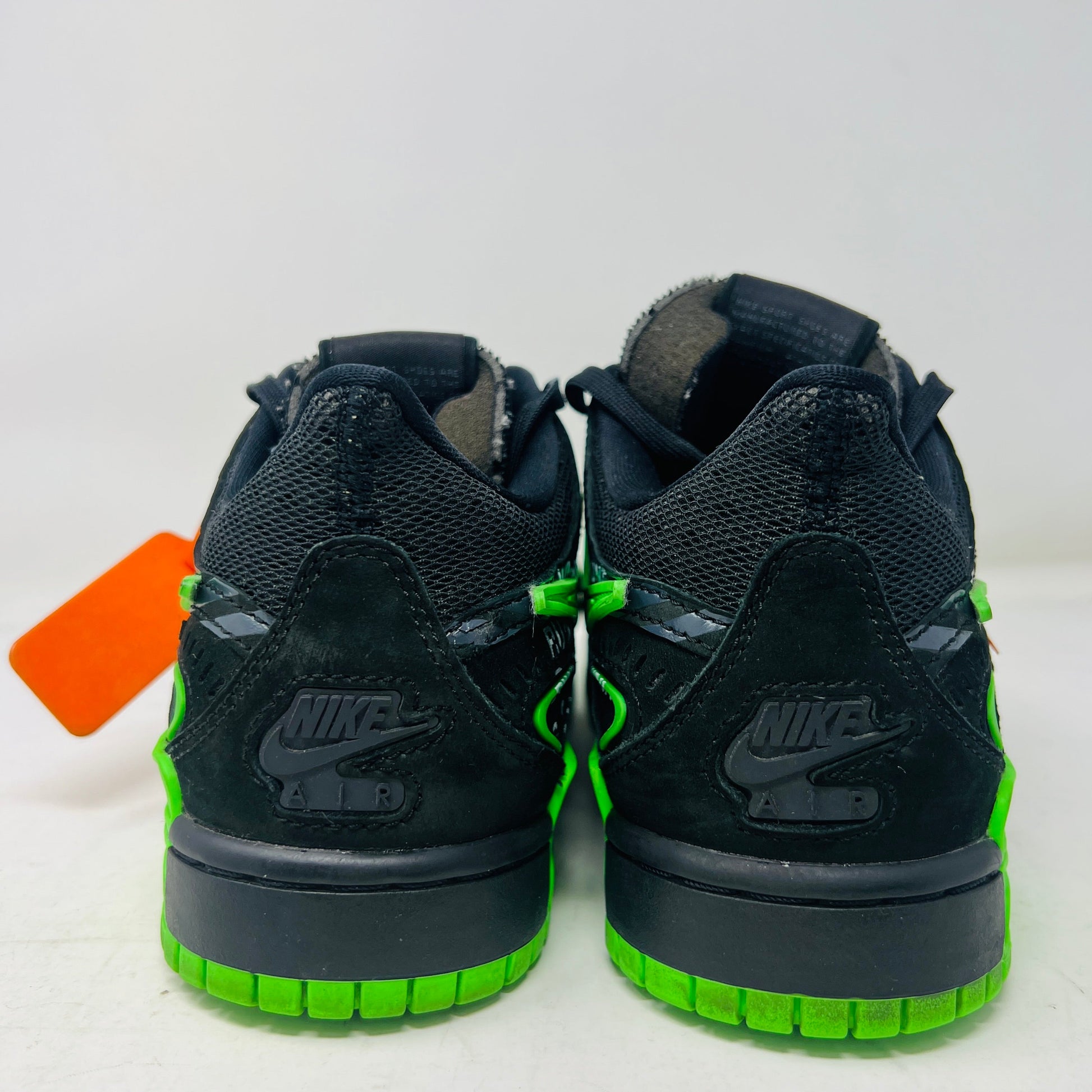 Nike Air Rubber Dunk Off-White Green Strike sneakers size 7, black and green design, lightly used.