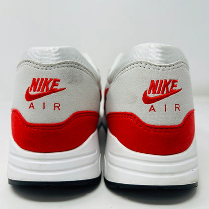 Authentic Nike Air Max 1 86 OG Big Bubble Sport Red sneakers, size 10.5, feature a white mesh upper with red accents and the iconic Nike logo on the tongue and side. In good condition with white laces and a red-and-white sole. Viewed from above.