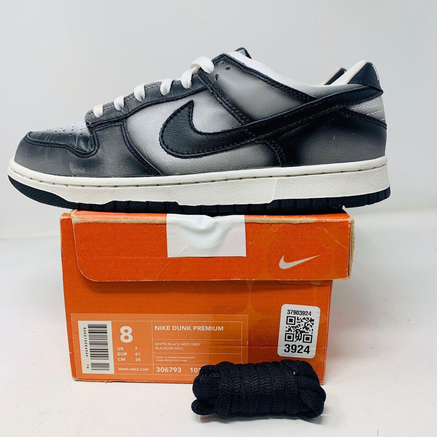 Nike Dunk Low Haze 2003 sneakers in size 8M, slight star loss and toe creasing, with black laces.