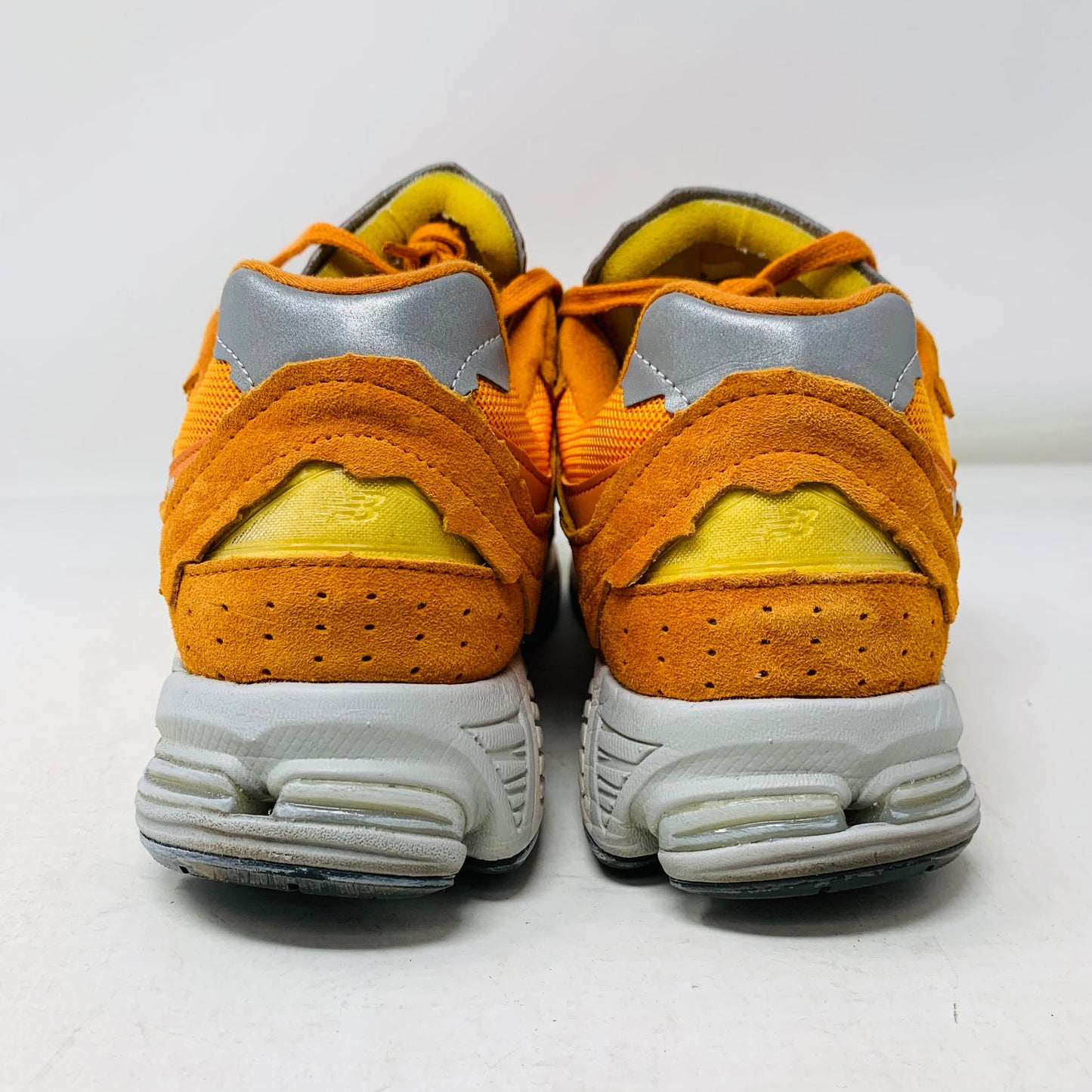 Balance 2002R Protection Pack Vintage Orange sneakers, size 9.5M, lightly used.