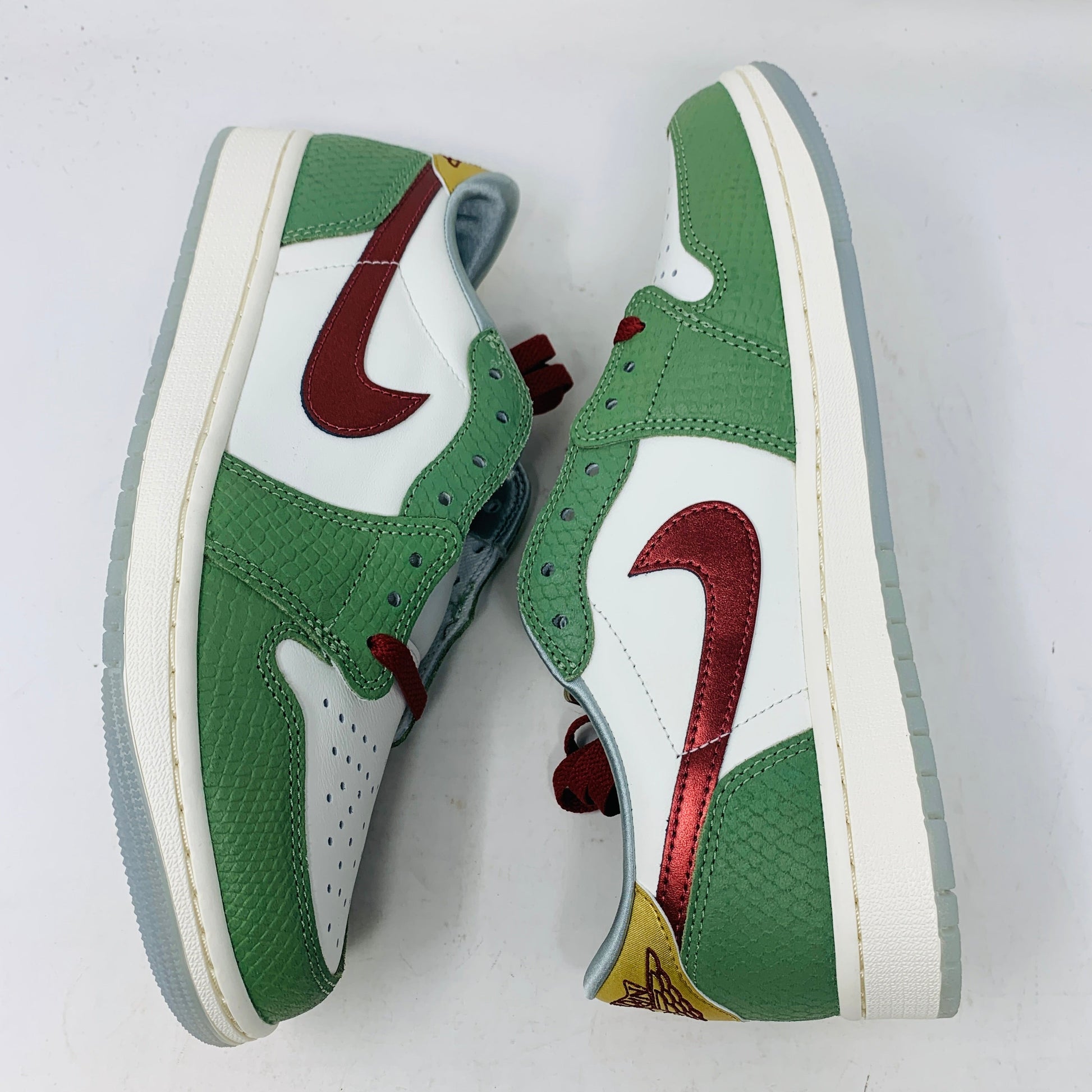 Jordan 1 Low Year Of The Dragon 2024 sneakers, green and white with red accents, brand new with hangtag.