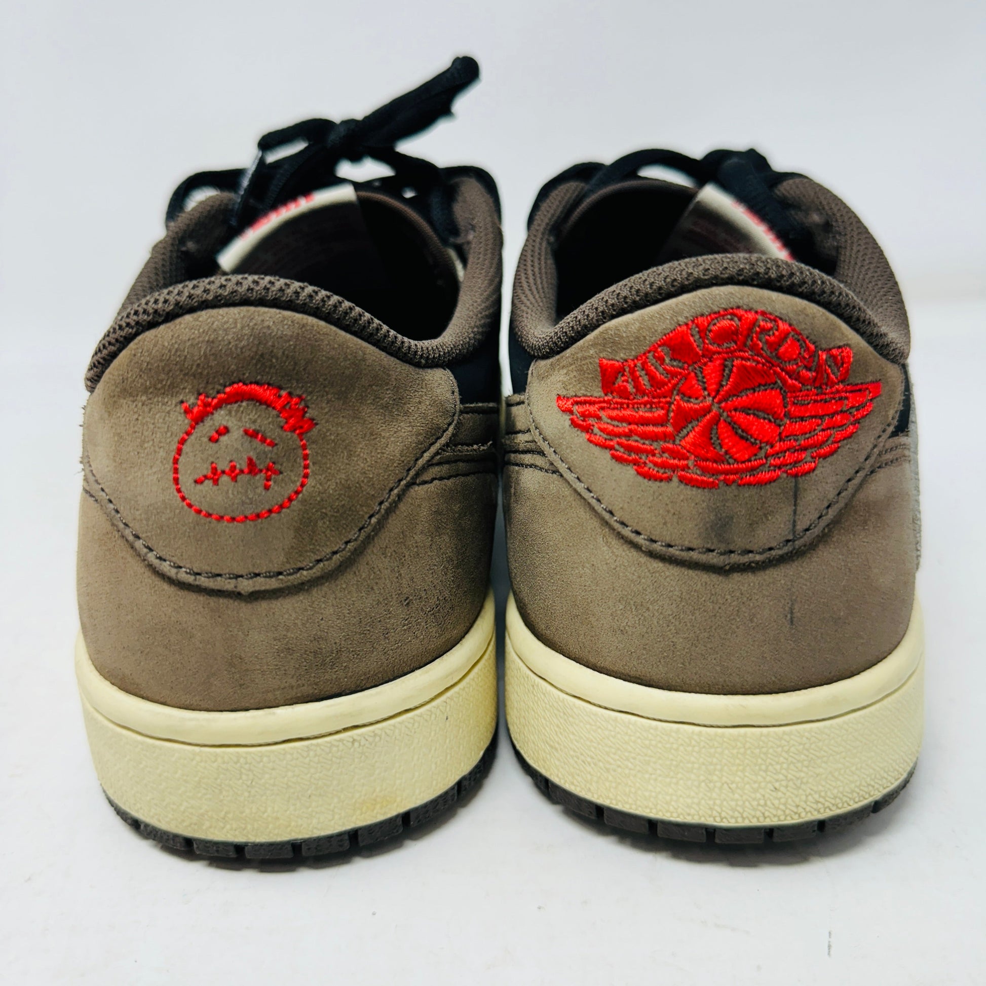 Jordan 1 Retro Low OG SP Travis Scott Mocha sneakers, size 10.5M, worn condition, year 2019.