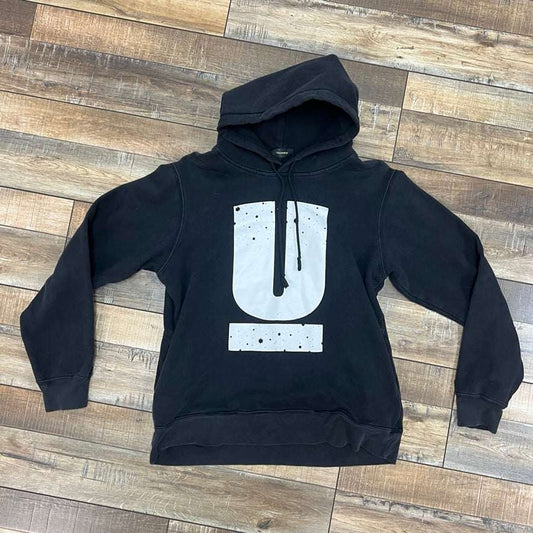 Black Star Hoodie with large 'U' design, size small, preowned condition.