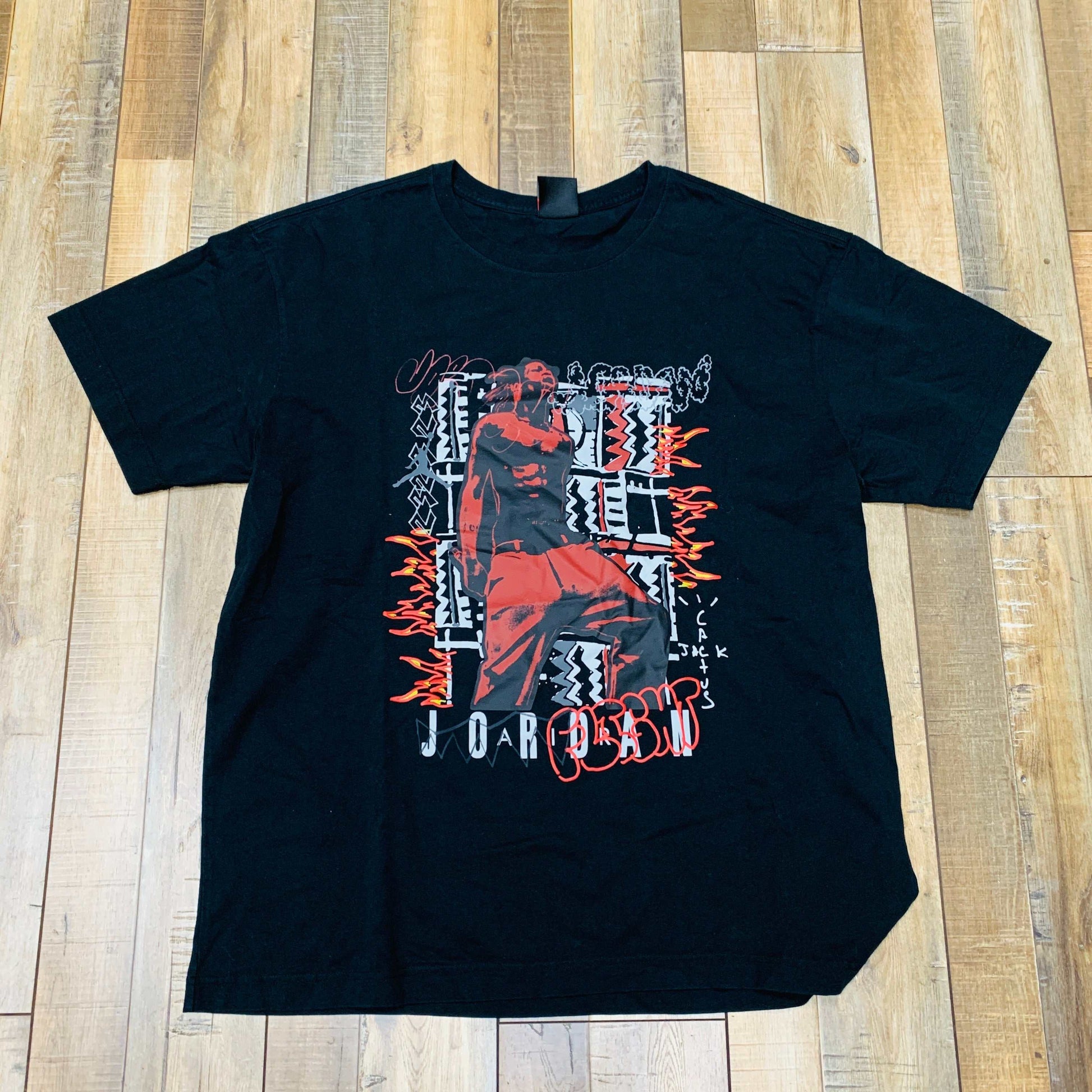 Travis Scott MJ 2 Tee Black on wooden floor background