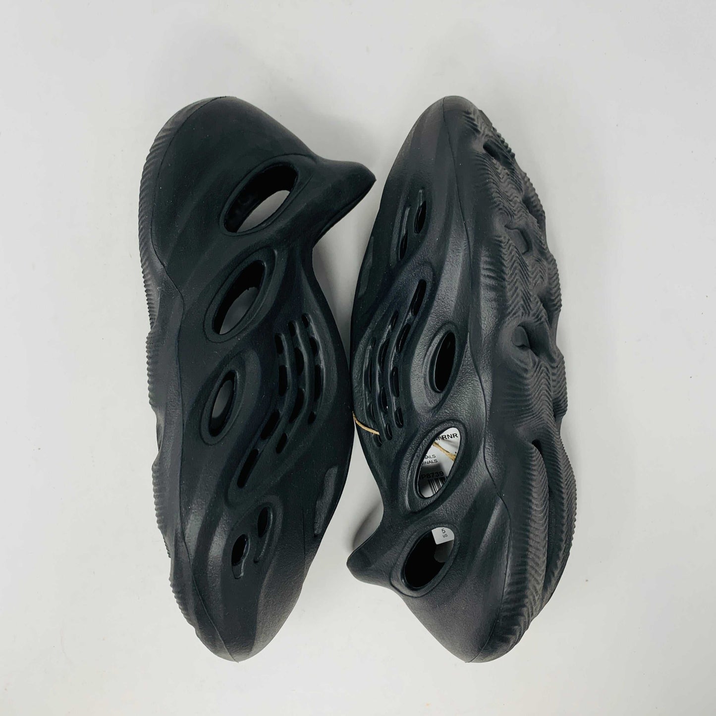 Yeezy Foam RNNR Onyx black 2022 edition sneakers.