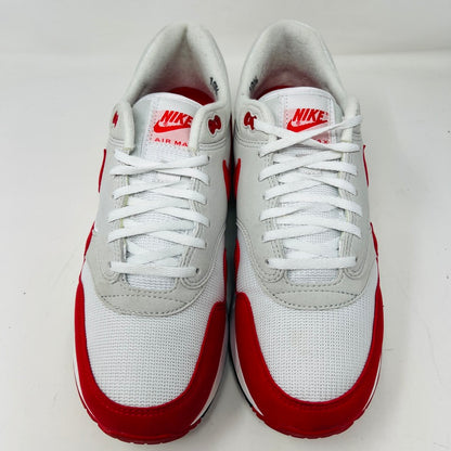 Authentic Nike Air Max 1 86 OG Big Bubble Sport Red sneakers, size 10.5, feature a white mesh upper with red accents and the iconic Nike logo on the tongue and side. In good condition with white laces and a red-and-white sole. Viewed from above.