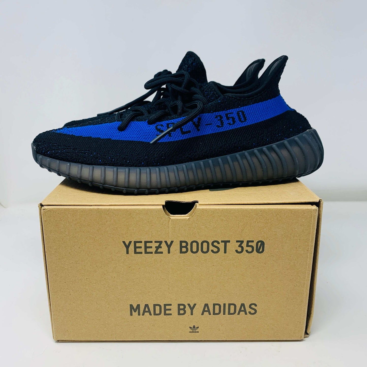 Yeezy 350 V2 Dazzling Blue sneaker on box, brand new condition.