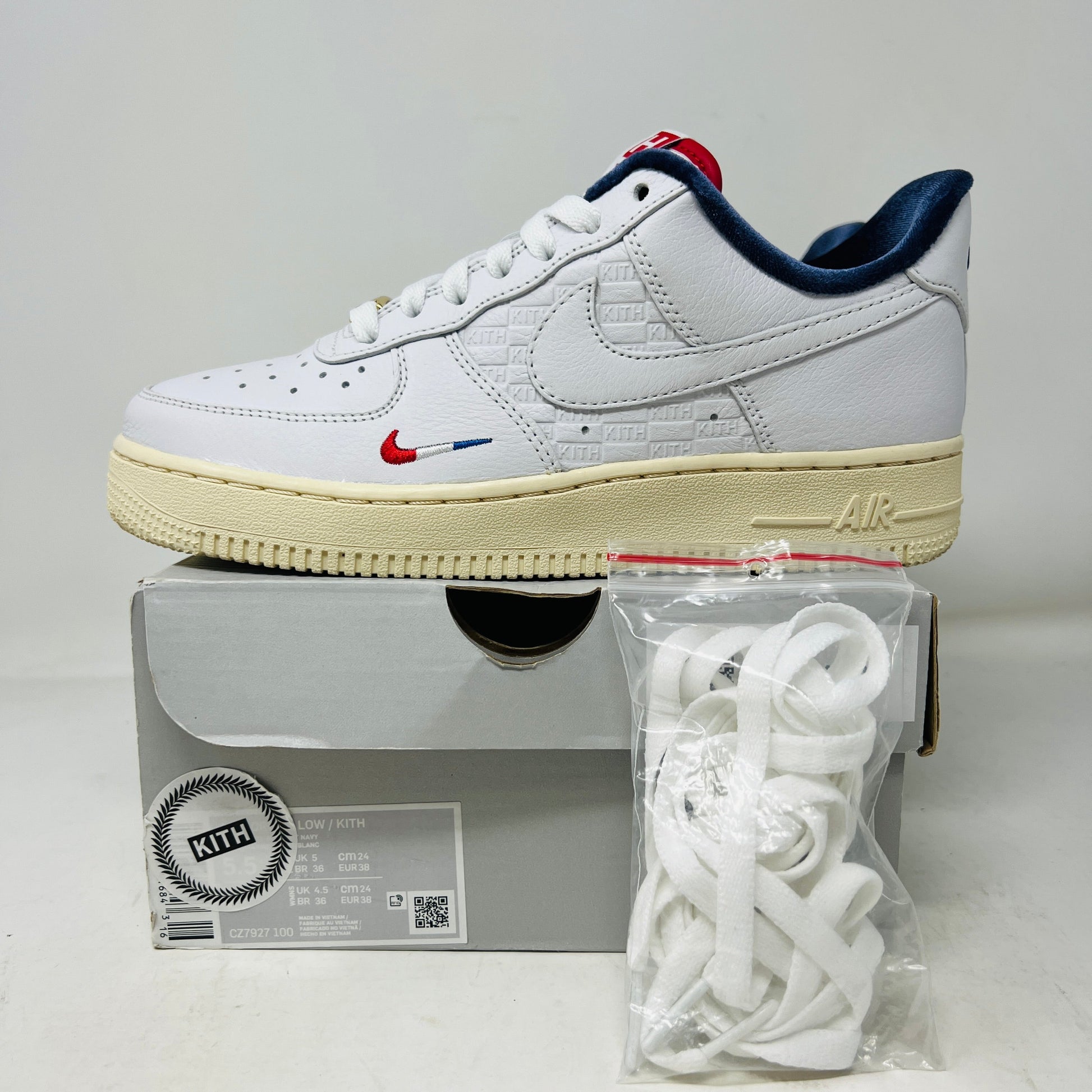 Nike Air Force 1 Low Kith Paris sneakers with box and extra laces, 2021 model.