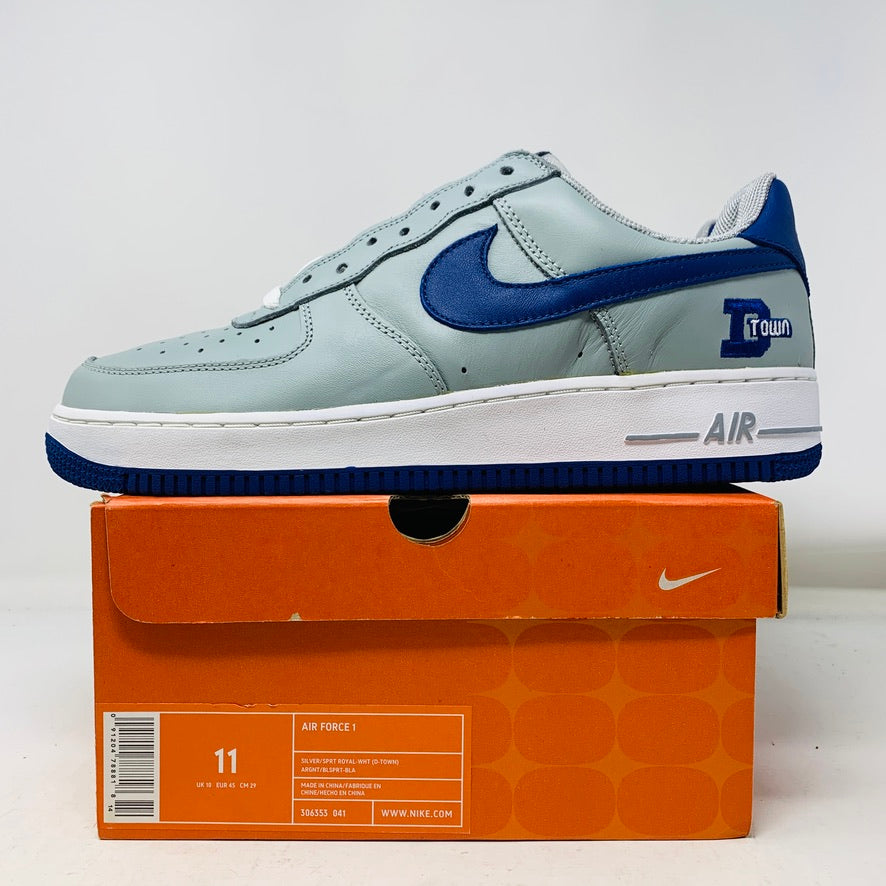 Nike Air Force 1 D Town sneaker, brand new 2005 edition, on orange box.