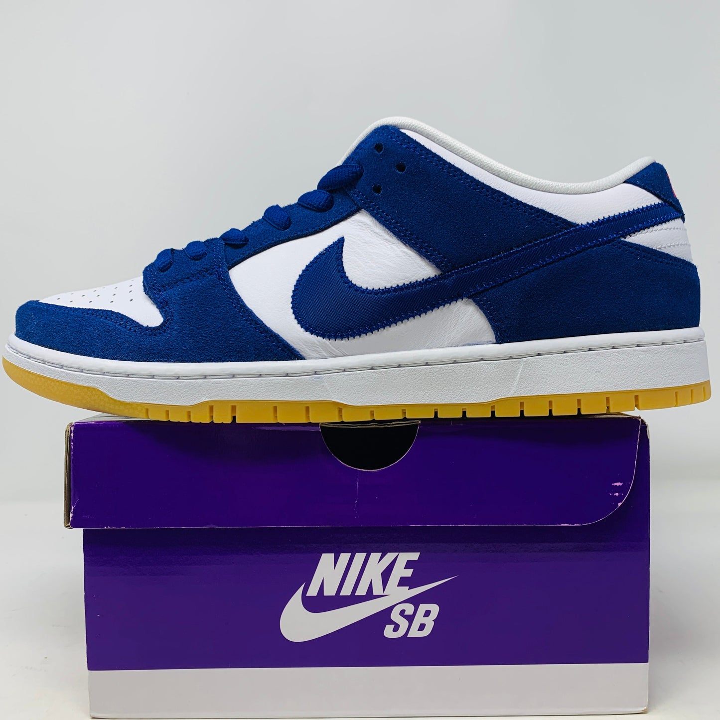 Nike SB Dunk Low Dodgers sneakers, brand new, 2022 model, with extra red and white laces.